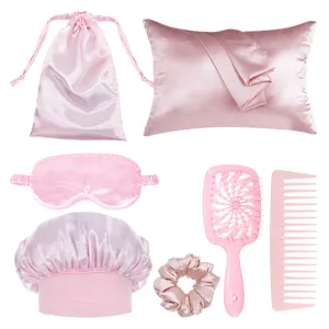 Ensemble de soins capillaires en satin rose avec taie bonnet brosse peigne masque.