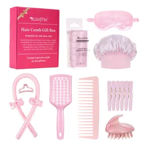 Pink hair styling gift box set with brushes, curlers, eye mask, and accessories for daily hair care.