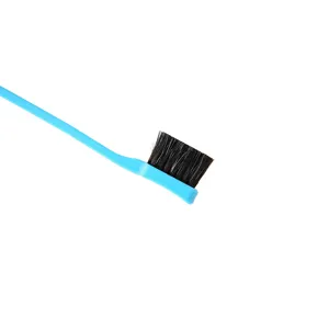 Professional dual-ended makeup brush with soft black bristles and blue handle for edge styling.