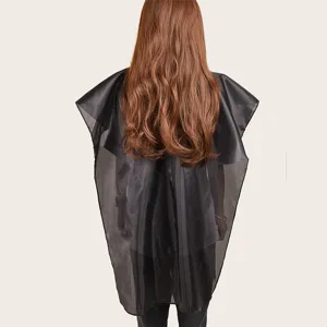 Professional black salon cape for hair cutting, lightweight hairdresser gown for styling.
