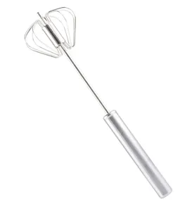 Stainless steel kitchen whisk detail, metal stirring rod for baking and salon use.