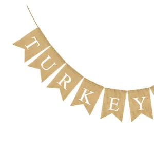 Close-up detail of Thanksgiving burlap swallowtail pennant banner featuring rustic turkey letters.