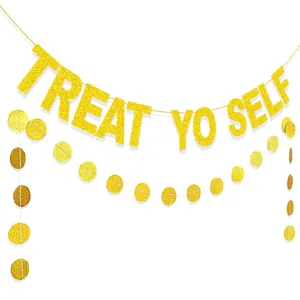Gold glitter party banner detail, hanging letter decor close-up for celebration events.