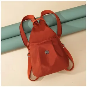 Minimalist solid color casual nylon drawstring backpack for women stylish daily commute travel bag