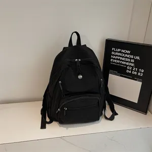 Minimalist black backpack for women, Korean style casual commuter daypack with multi pockets.