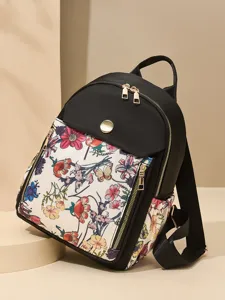 Damen Mode lässig Blumen Druck Nylon Rucksack mit goldenen Beschlägen und geräumigen Fächern.