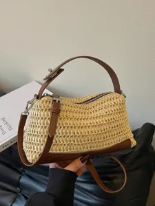 Stylish straw woven handbag for women, featuring brown leather trim and versatile crossbody strap.