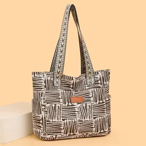 Casual retro canvas tote bag with large capacity, stylish pattern and comfortable straps for women.