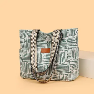 Casual striped canvas tote bag for women, large capacity retro shoulder bag for daily commuting.