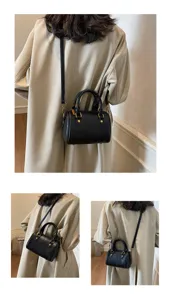 Elegant black Boston handbag for women, versatile crossbody shoulder bag with chic hardware.
