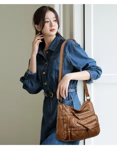 Women vintage brown leather shoulder bag casual multi-pocket crossbody bag for daily commute.