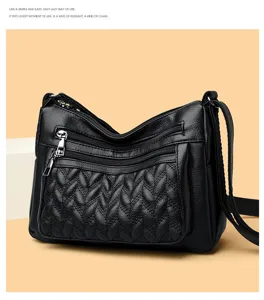 Black soft leather crossbody bag detail, multi zipper pockets and chic quilted front design.
