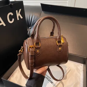Vintage brown Boston shoulder bag for women, retro PU leather crossbody handbag with top handle.
