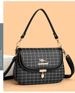 Retro minimalist women's plaid shoulder crossbody bag with top handle and chic leaf pendant.