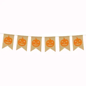 Halloween burlap banner detail showing the orange jack-o-lantern printed festive flags.