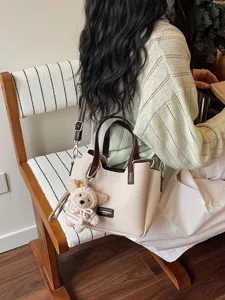 Chic minimalist lightweight women's handbag, stylish Korean casual shoulder crossbody bag.