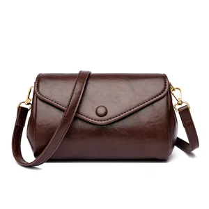 Retro minimalist women shoulder crossbody bag, elegant brown leather handbag for daily wear.