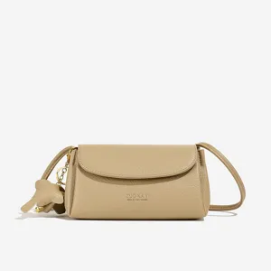 Retro minimalist women shoulder crossbody bag, casual versatile handbag with cute elephant charm.