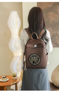Stylish women brown backpack with elegant elephant rhinestone patch for daily casual commute use