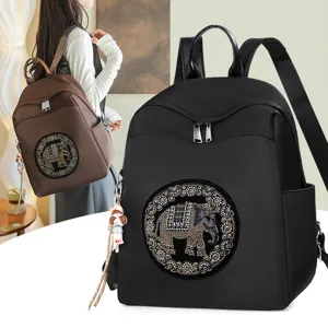 Casual women nylon backpack with cute elephant rhinestone patch and pendant for travel.