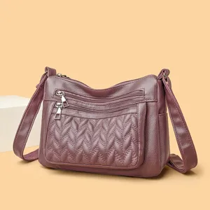 Women soft leather crossbody bag, fashion large capacity multi pocket shoulder bag for daily use.