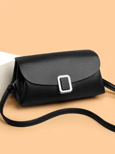 Black leather shoulder crossbody bag for women, classic retro flap design with silver buckle.