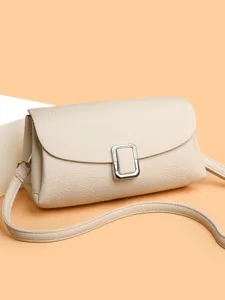 Elegant retro minimalist beige leather shoulder bag for women, versatile stylish crossbody.