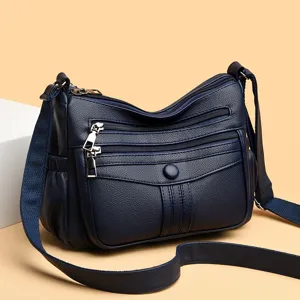 Borsa a tracolla vintage in morbida pelle multi-tasche da donna capiente e casual.