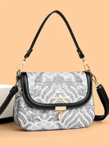 Elegant vintage women's shoulder crossbody bag with unique wave pattern and chic gold hardware.