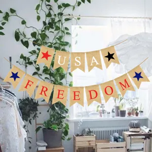 Burlap banner detail showing USA and Freedom lettering with star prints for party decor.