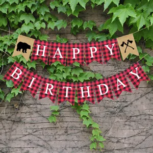 Detailed view of red and black plaid Happy Birthday banner with bear and axe burlap flags.