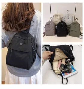 Minimalist nylon backpack with large capacity and multi-layer pockets for casual daily use.