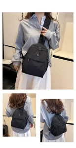 Stylish black nylon backpack for women, multi-layer large capacity casual daily travel bag.