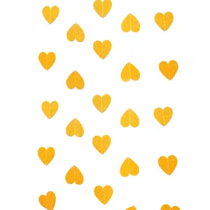 Gold glitter heart garland detail shot showing sparkling hanging heart decorations for parties.