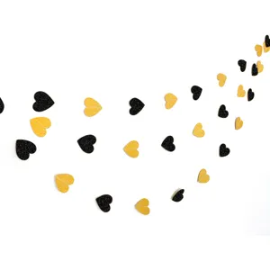 Black and gold glitter heart garland for wedding party decoration, romantic hanging banner.