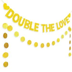 Gold glitter double the love letter banner and circle dots garland detail view for party decor.