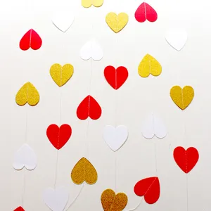 Hanging heart garland for wedding party decoration, red white and gold glitter paper hearts.