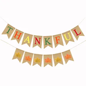 Thanksgiving burlap banner set with THANKFUL letters and maple leaf flags for party decor.