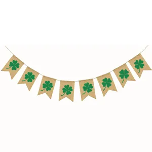 St. Patrick's Day green clover burlap banner detail, festive hanging party bunting.