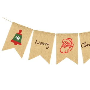 Christmas burlap pennant banner detail showing festive Santa and bell printed rustic party decor