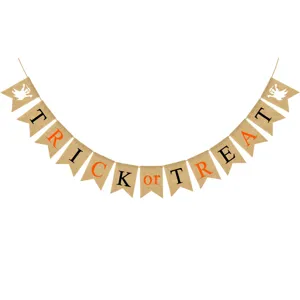 Halloween burlap banner detail showing Trick or Treat letters and ghost graphics for party decor.