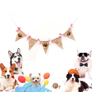 Pet party burlap triangle flag banner detail showing paw print patterns and cute pink bows.