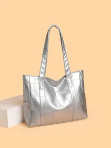 Stylish large capacity metallic silver PU leather shoulder tote bag for women casual daily use.