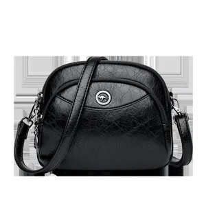 Women's black PU leather shoulder bag casual crossbody handbag with multi-pockets and metal logo.