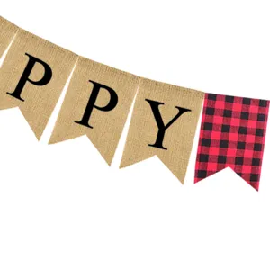 Burlap banner detail showing black letters on rustic fabric with red and black buffalo plaid.