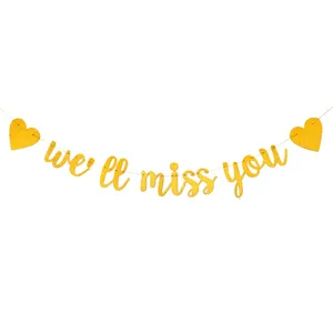 Gouden glitter we'll miss you banner detail, close-up van feest hangende decoratie.