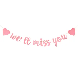 Roze glinsterende we'll miss you slingers voor pensioen afscheid feest decoratie