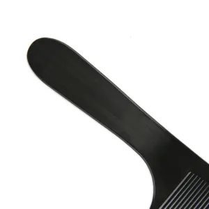 Professional black barber S-shape clipper comb for flat top hair styling and salon use.