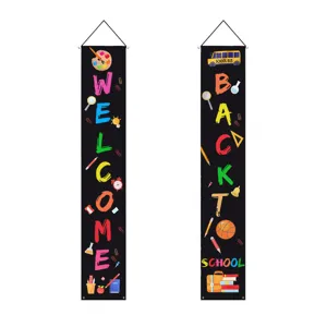 Back to school door banner decoration detail, colorful letters and school elements on black fabric.