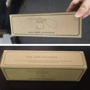Haarfaser-Applikator Sprühflasche Detailansicht mit Kraftpapier-Verpackungsdesign.